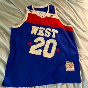 A very used NBA Hardwood Classics Allstar West Lucas Number 20 Jersey